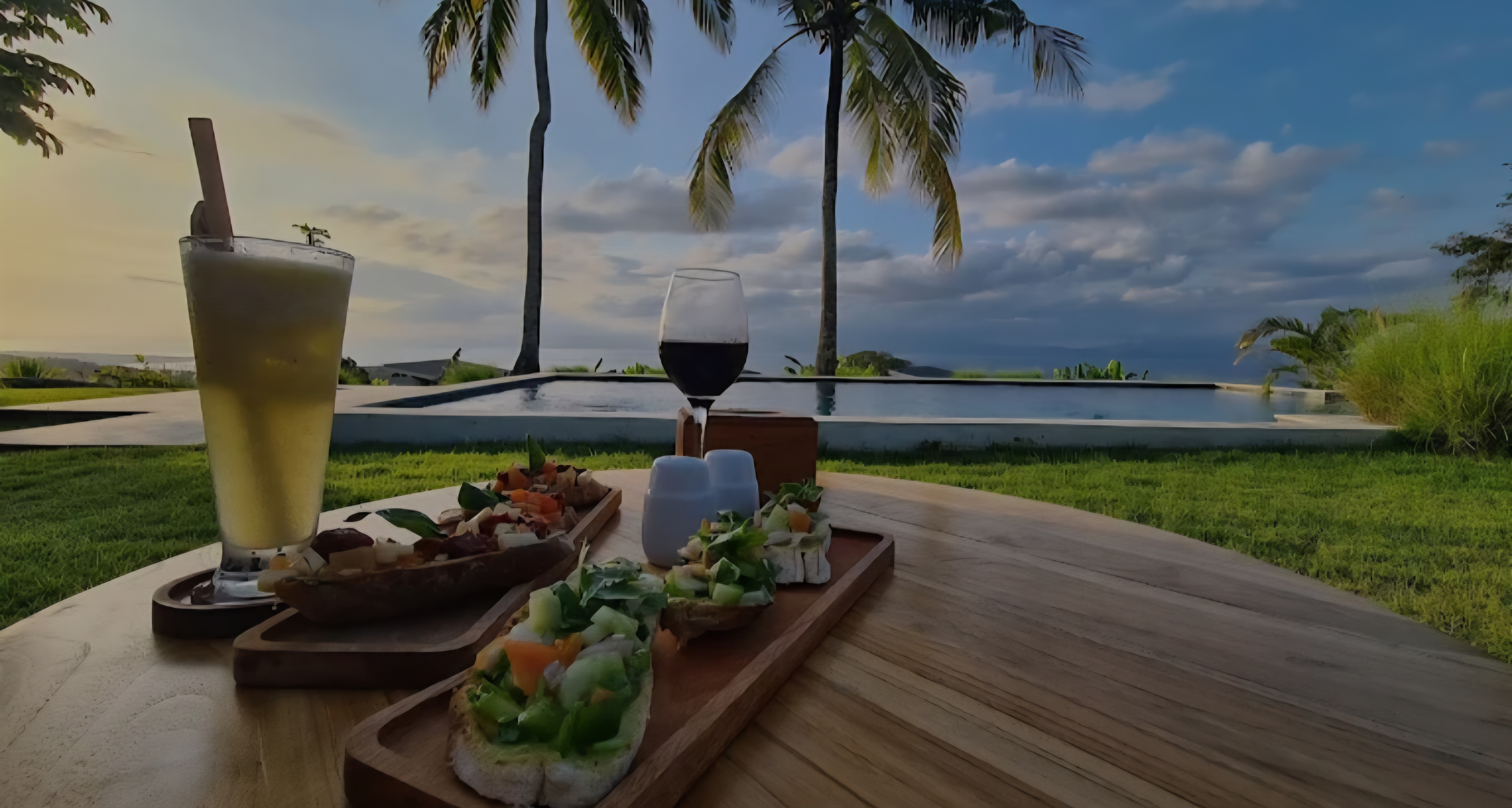 Klik untuk memilih gambar Eden Bar Lounge at sunset with Mount Agung on the horizon